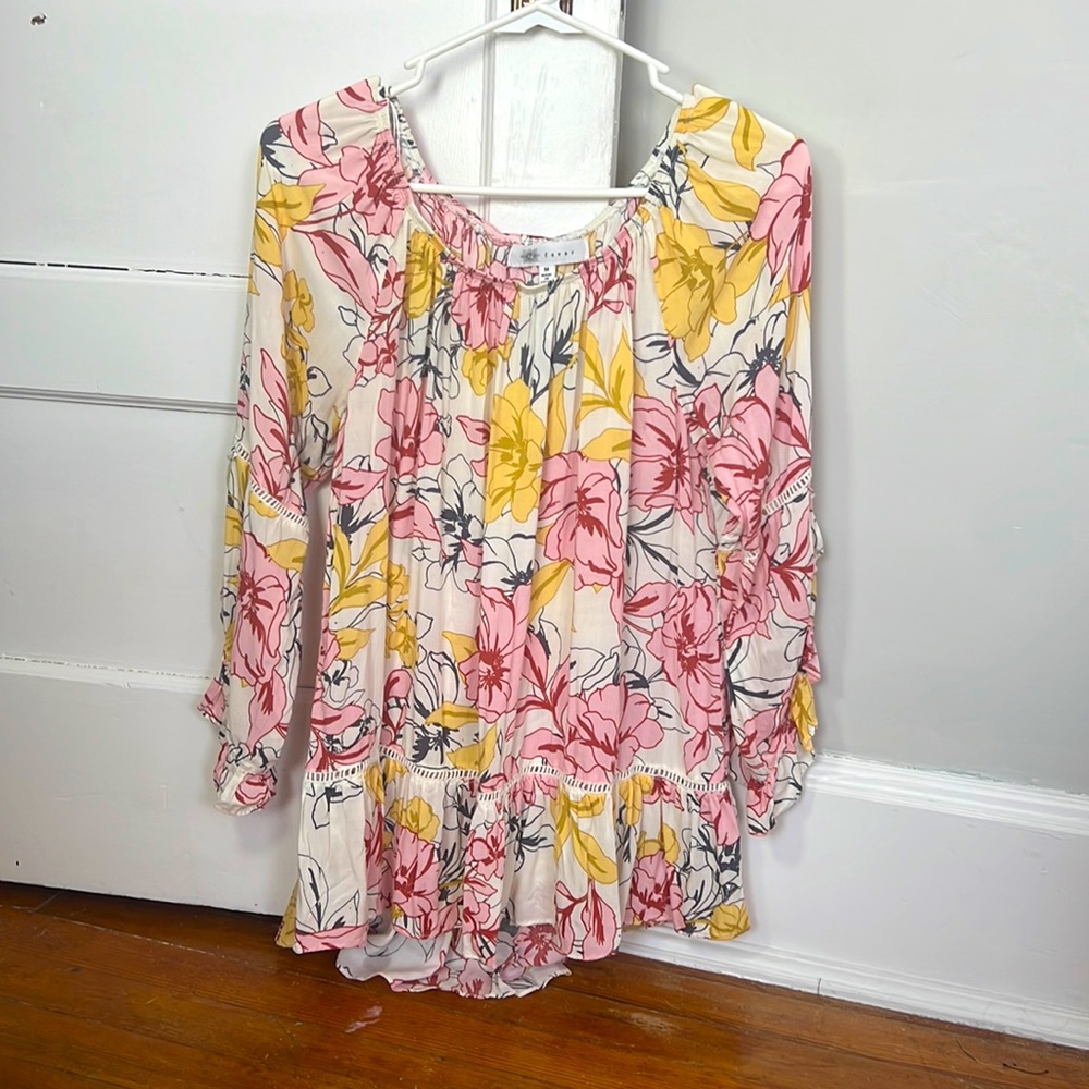 pink and yellow floral blouse.
